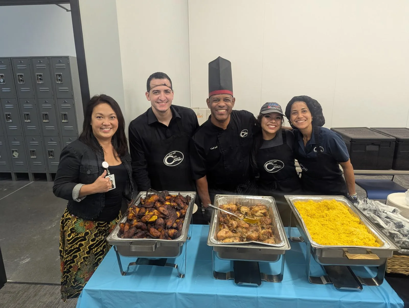Chef Joel and his team serving a Cuban corporate lunch buffet