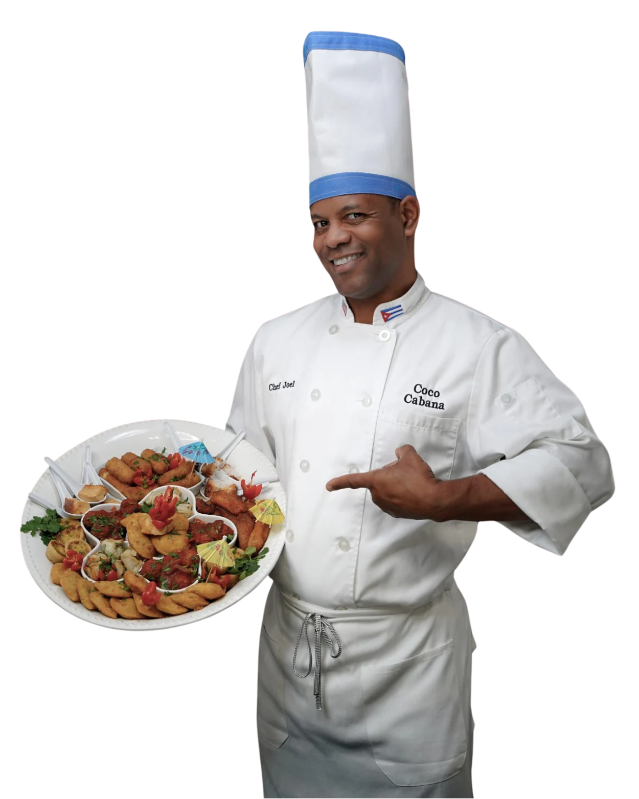 Chef Joel presenting a platter of Cuban tapas