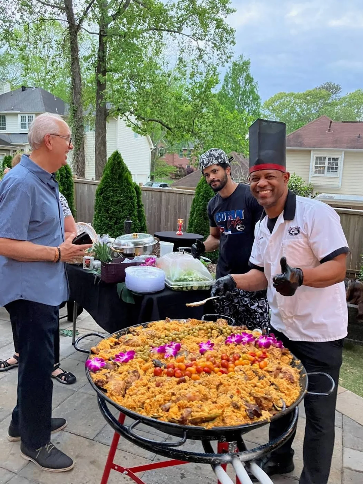 Chef Joel and his team at R Taber's backyard paella party