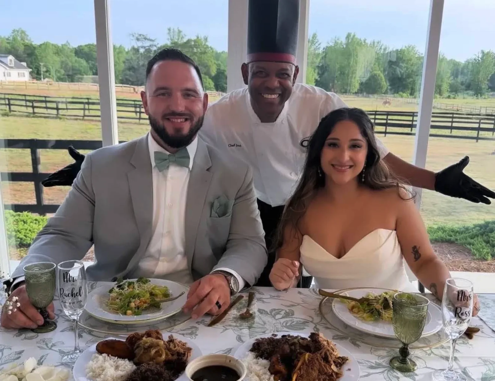 Chef Joel presenting the plated dinner behind a newlywed couple