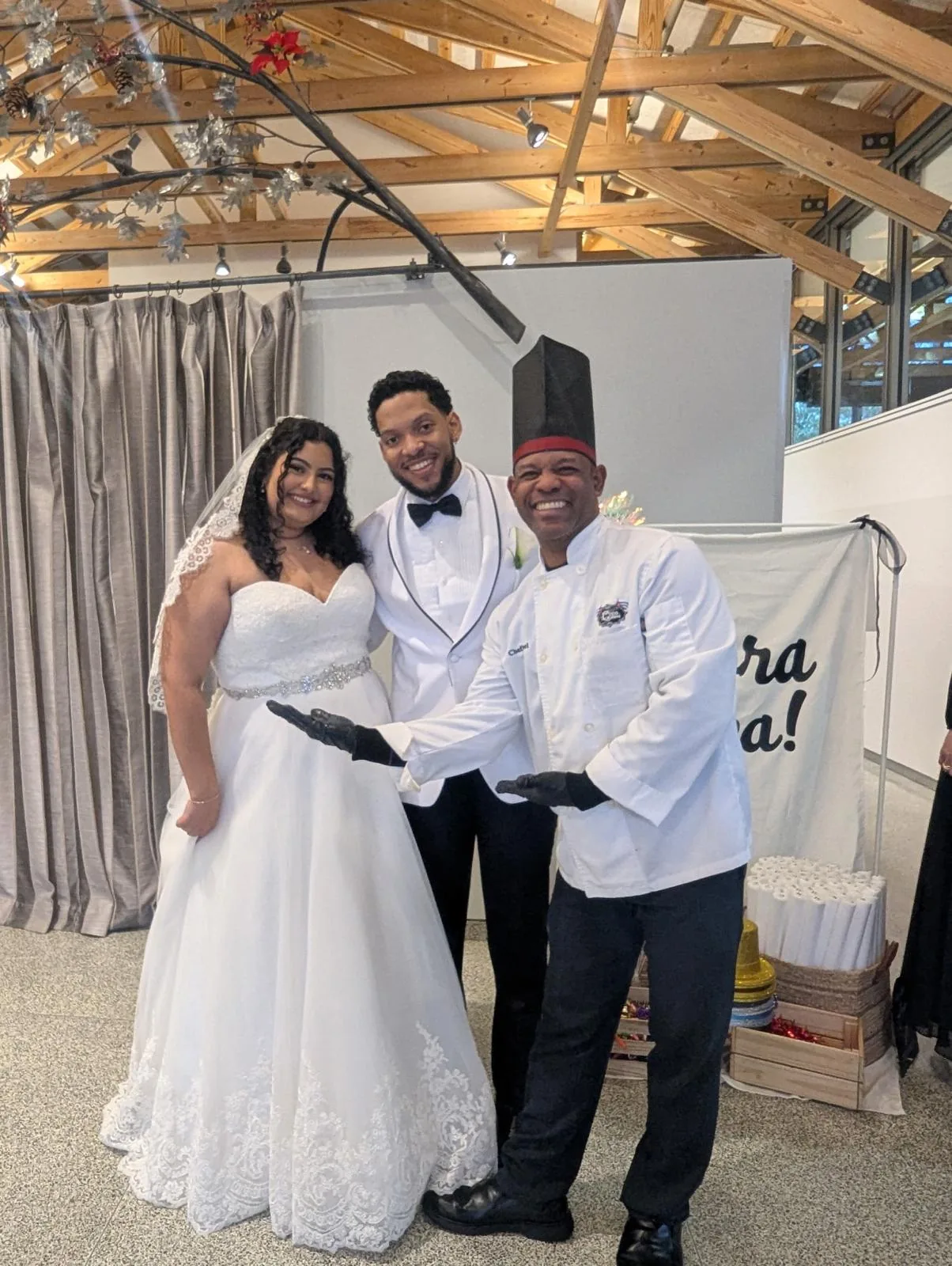 Chef Joel serving a bride at her Cuban wedding buffet